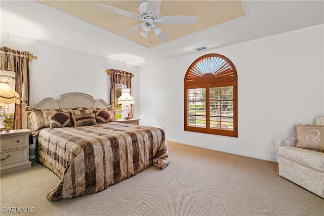 bedroom featuring ceiling fan and carpet flooring