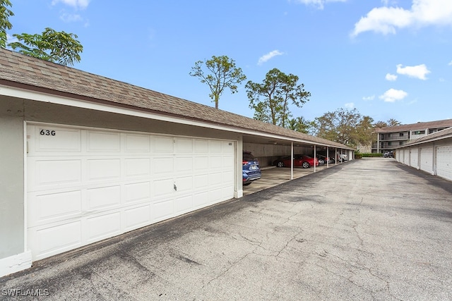 garage with a carport