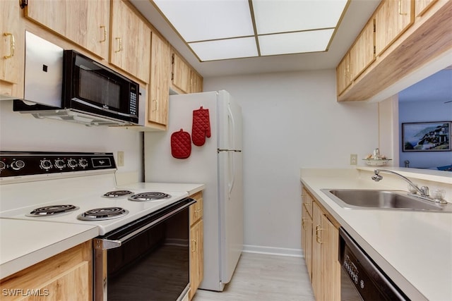 kitchen featuring light hardwood / wood-style floors, sink, dishwashing machine, light brown cabinets, and white electric range