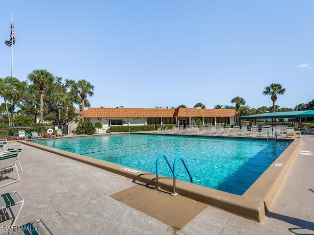 view of swimming pool featuring a patio