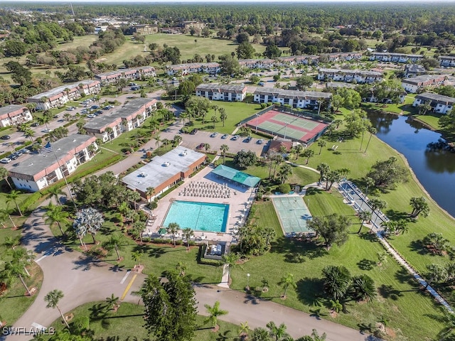 bird's eye view with a water view