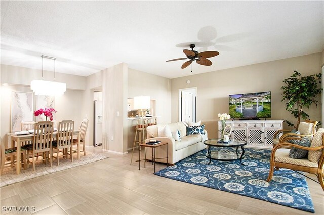 living room with ceiling fan