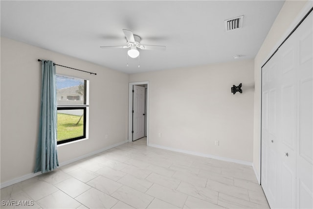 empty room with ceiling fan