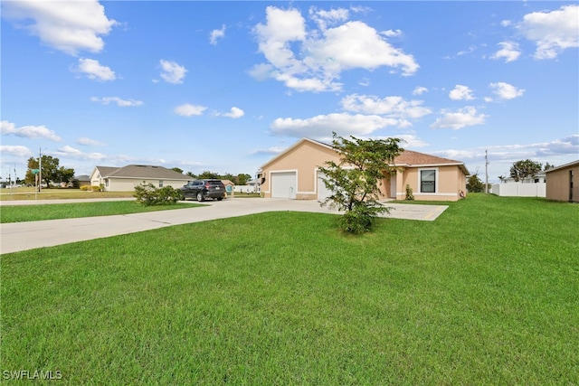 view of front facade featuring a front lawn and a garage