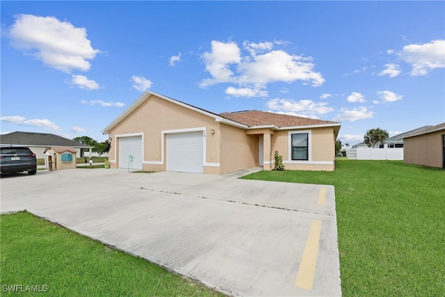 ranch-style home featuring a garage and a front lawn