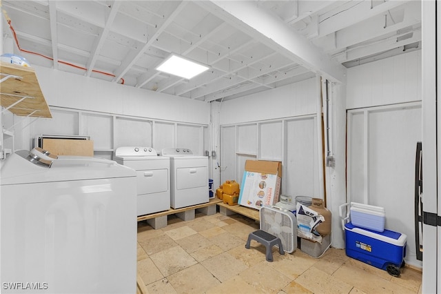 washroom featuring independent washer and dryer