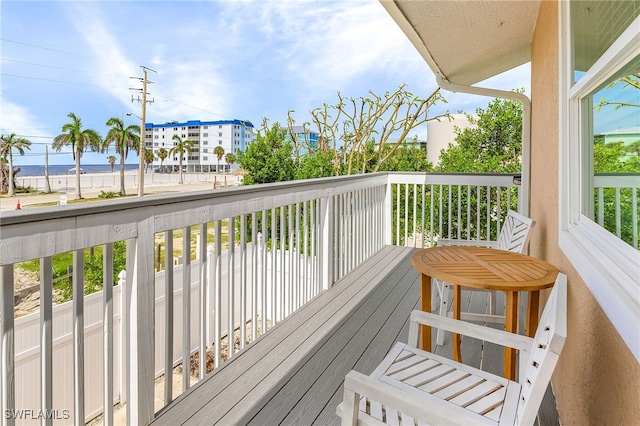 deck featuring a water view