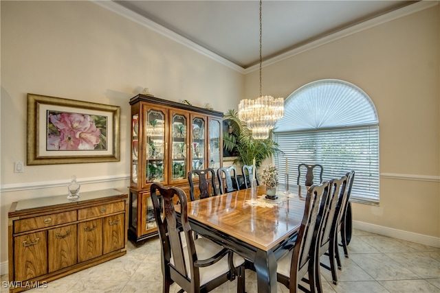 dining room featuring a chandelier, light tile patterned flooring, and crown molding