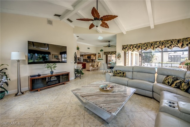 living room with high vaulted ceiling, ceiling fan, beam ceiling, and light tile patterned floors