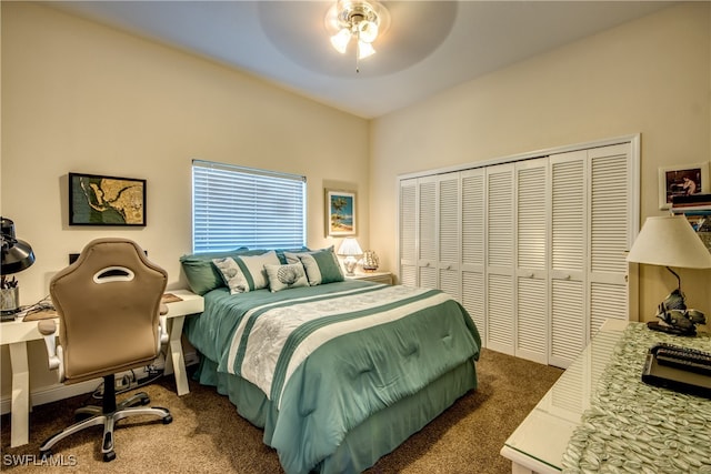 carpeted bedroom featuring ceiling fan and a closet