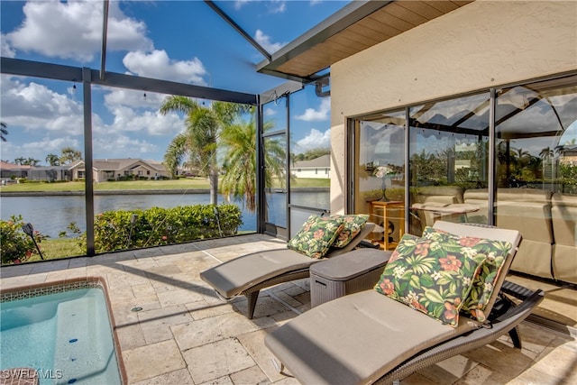 sunroom with a water view