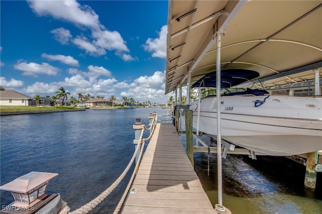 dock area featuring a water view