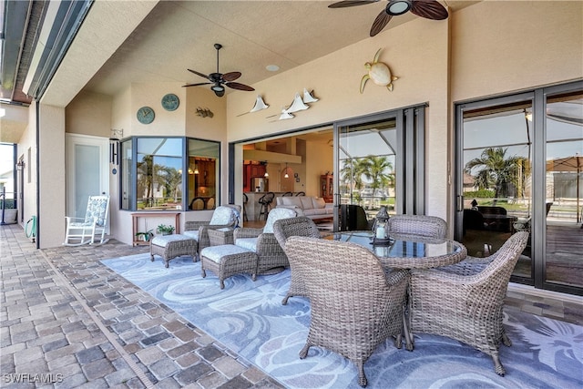 view of patio / terrace featuring ceiling fan