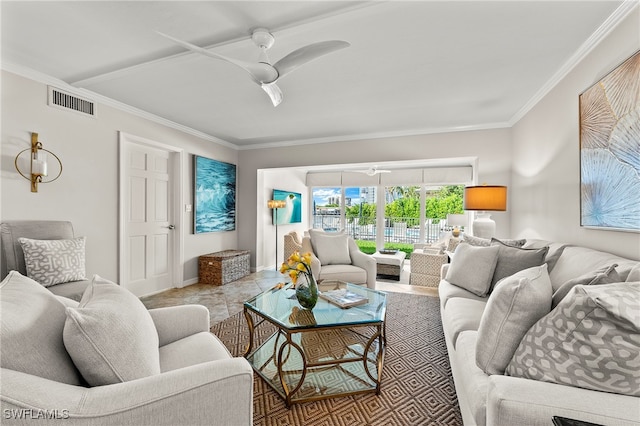 living room featuring crown molding and ceiling fan