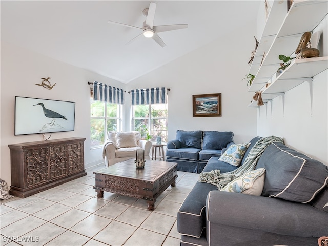 living room featuring high vaulted ceiling, ceiling fan, and light tile patterned floors