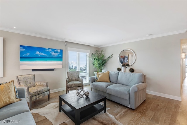 living room with ornamental molding and light wood-type flooring