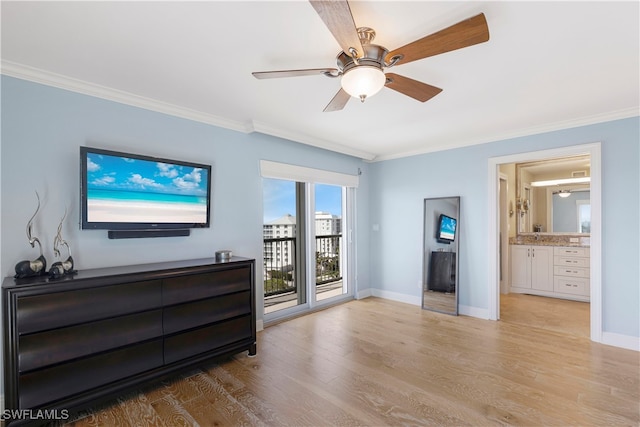 living room featuring ceiling fan, light wood-type flooring, and ornamental molding