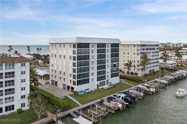 view of building exterior with a water view