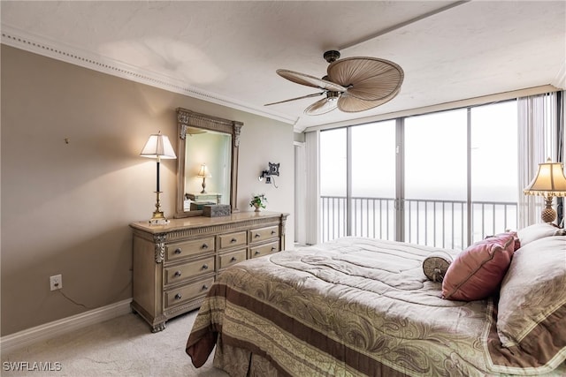 carpeted bedroom with ornamental molding, ceiling fan, and access to exterior