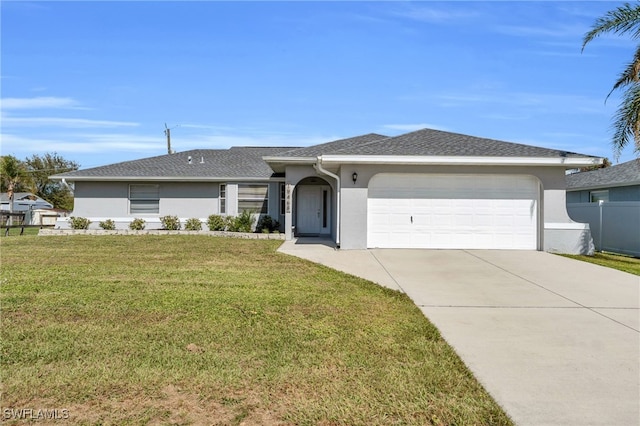 ranch-style home featuring a front yard and a garage