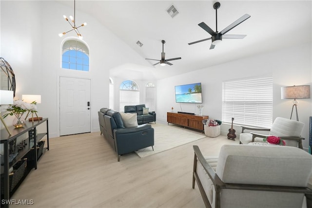 2532 Blackburn Cir, Cape Coral, FL 33991 - living room featuring high vaulted ceiling, light wood-type flooring, and a ceiling fan
