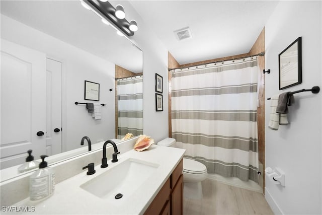 2532 Blackburn Cir, Cape Coral, FL 33991 - bathroom featuring toilet, vanity, a shower with curtain, and baseboards