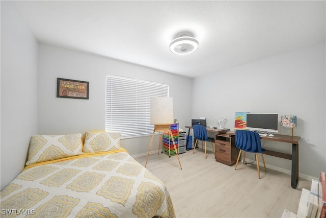 2532 Blackburn Cir, Cape Coral, FL 33991 - bedroom featuring wood finished floors, an office area, and baseboards