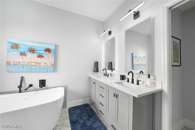 2532 Blackburn Cir, Cape Coral, FL 33991 - full bath featuring double vanity, baseboards, and a soaking tub