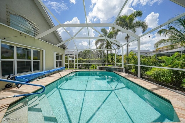 2532 Blackburn Cir, Cape Coral, FL 33991 - view of swimming pool with a covered pool and glass enclosure