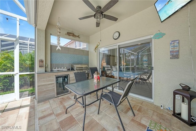 2532 Blackburn Cir, Cape Coral, FL 33991 - view of patio featuring beverage cooler, area for grilling, grilling area, glass enclosure, and a ceiling fan