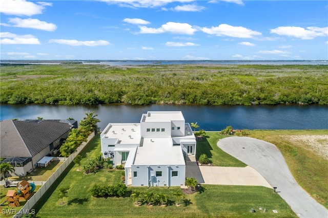 birds eye view of property with a water view