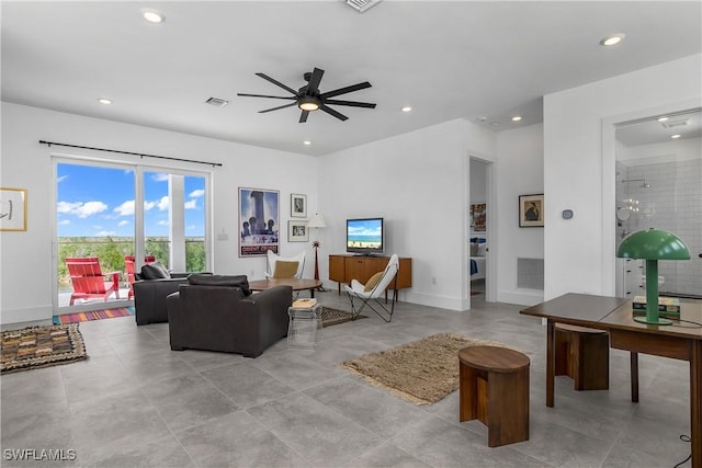 living room featuring ceiling fan