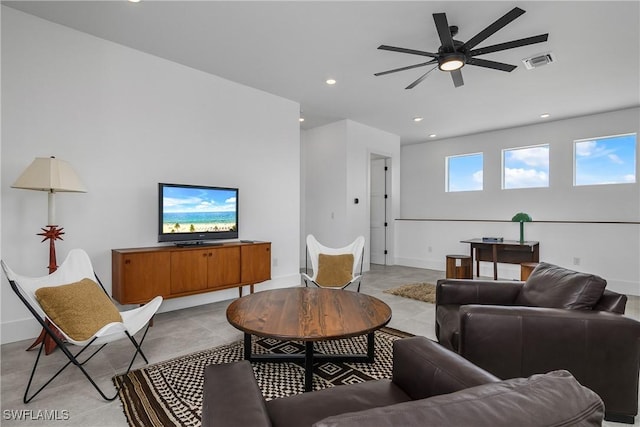 living room with ceiling fan