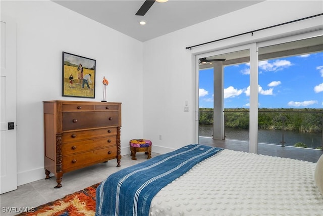 bedroom featuring ceiling fan and access to exterior