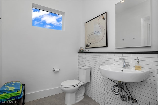 bathroom with toilet and sink