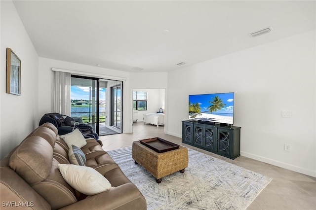 living room featuring light tile patterned floors