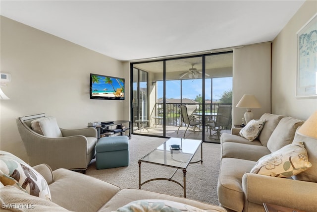 living room featuring carpet flooring and expansive windows