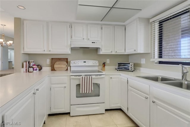 kitchen with light tile patterned floors, under cabinet range hood, electric range, a sink, and white cabinets