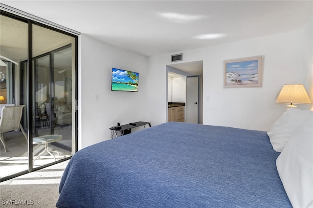 bedroom featuring access to outside, floor to ceiling windows, and visible vents