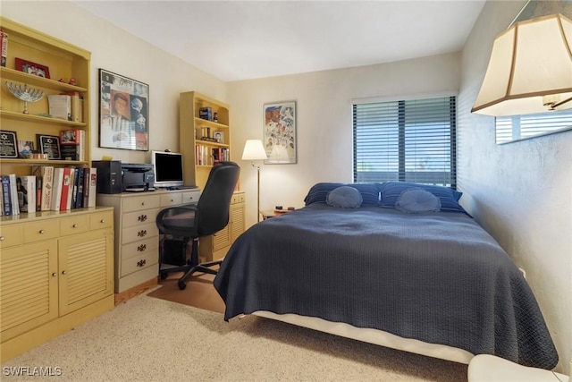 bedroom featuring multiple windows