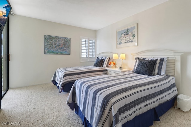 bedroom featuring carpet flooring