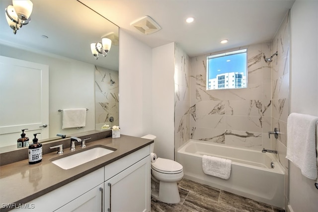 full bathroom with toilet, tiled shower / bath combo, vanity, and hardwood / wood-style flooring