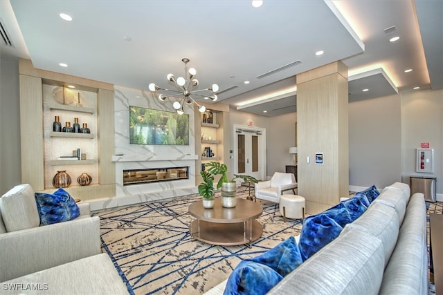 living room with an inviting chandelier