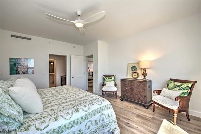 bedroom featuring light hardwood / wood-style flooring and ceiling fan