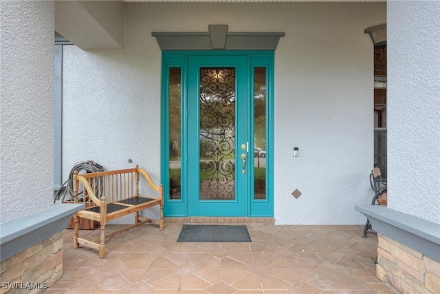 doorway to property featuring french doors