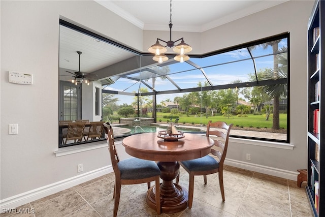 dining room with crown molding, ceiling fan, and a healthy amount of sunlight