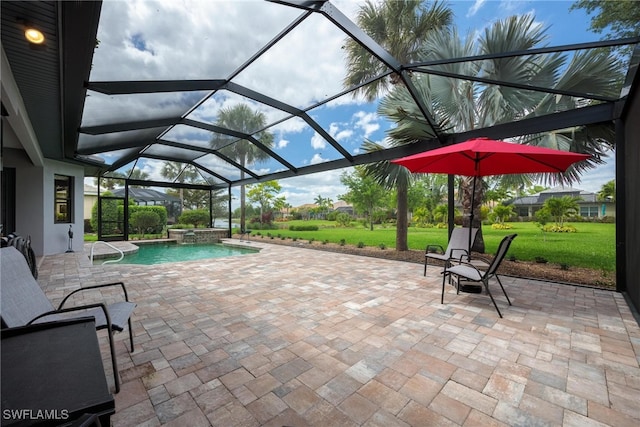 view of patio / terrace featuring glass enclosure and a pool with hot tub