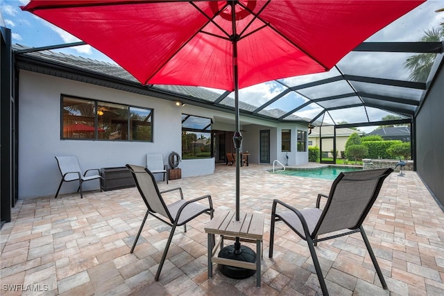 view of patio with a lanai