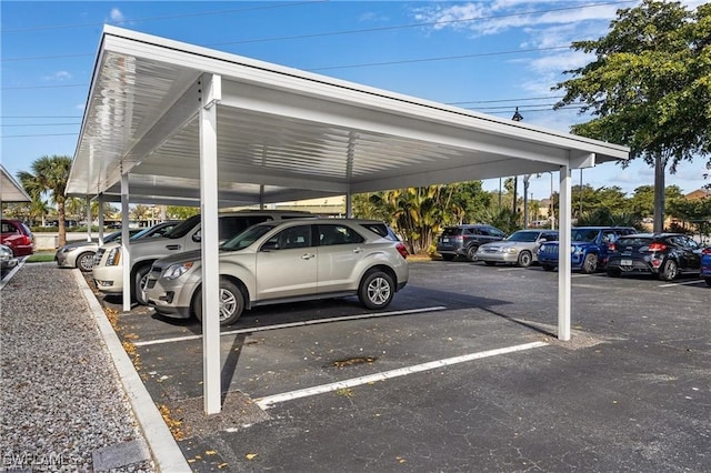 view of parking featuring a carport