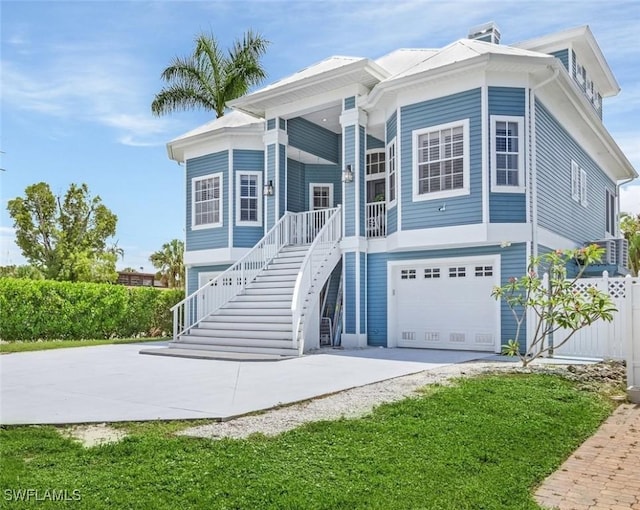 view of front of home featuring a porch and a garage